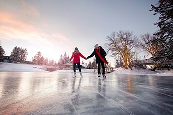 Ice skaters on Bowness Lagoon